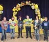 The top spellers from the bee: eighth- grader Aslyn Foley, eight-grader Marion Hudson, eight-grader grader Jonathan Villapondo, the winner, seventh-grader Brennen Ling, eighth-grader Laralyn 