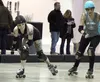 Catrina Nugent (Fireweed Fury) competes for the Denali Derby Dolls against Far North Derby Saturday. Tim Rockey/Frontiersman