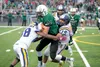 A pair of Lathrop defenders stop Colony’s Daniel Bilafer during the Knights win over the Malemutes at Colony High School Friday night. ROBERT DeBERRY/Frontiersman.com