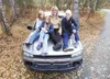 ROBERT DeBERRY/Frontiersman Kerri Whittecar sits with her
daughters from left, Jaymi, 13, Heather, 10, and Whitney Masters,
17, on the hood of their soon-to-be-retired Chevy Trail Blazer at
t