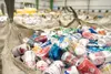 Large bags of aluminum cans sit ready for baling at the new
Valley Community for Recycling Solutions location. ROBERT
DeBERRY/Frontiersman