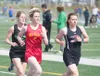 Houston's Allison VanPelt runs in the girls' 1600 meters at the Palmer Invitational on Saturday, May 14, 2017. Colony's Jill Bowker is at far left. Photo courtesy Stephen Nowers