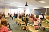 K.B. Holbrook greets a group of Knik Elementary fifth-graders during the opening ceremony for Kids2College day at Mat-Su College April 18. Courtesy Rebecca Oprish Photogra