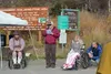 Roy Wahl (center) thanks the many volunteers and workers who helped create the accessible trail at the Government Peak Recreation Area. Anthony Jones/Frontiersman/