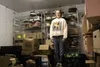Palmer Food Bank Director Jeanne Borega stands among donated items in the walk-in cooler Tim Rockey / Frontiersman