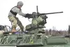 Spc. David Harper, a native of Johnstown, Ohio, assigned to the 95th Chemical Company, “Arctic Dragons”, 17th Combat Sustainment Support Battalion, U.S. Army Alaska, prepares to execute a gun