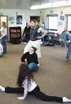 Dance class has become a favorite among Burchell students. They
have to be devoted to participate -- the class starts an hour
before regular courses do. Students perform a number of dances fr