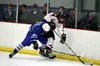 Houston's Anfim Konev works to maintain possession along the boards during a win over Palmer. Bruce Eggleston/matsusports.net