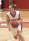 Wasilla's Tonya James drives to the side to create a passing
lane in the first quarter of Saturday's game against Chugiak. Photo
by TIM BRODT/Frontiersman.