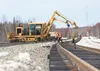 Workers build a section of track in Segment 6 of the Port MacKenzie Rail Extension in this Frontiersman file photo. The state’s new capital budget does not include funding to finish the proje