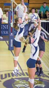 Quinnipiac freshman Allison Leigh leaps for a block during a match against Providence earlier this season. Leigh, a 2013 graduate of Colony High School, currently leads the Division I Metro A