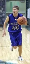 Palmer's Dustin Dubois brings the ball down the court for the
Moose in Palmer's 59-46 win over Valley foe Colony on Friday. Photo
by JEREMIAH BARTZ/ Frontiersman.