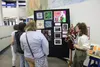 Jay Clark explains her work to members of the public during Palmer High School's annual art exhibit. Jacob Mann/Frontiersman