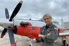 CORPUS CHRISTI, Texas (March 4, 2020) – Ensign Christa Robison, a student naval aviator assigned to Training Air Wing 4, Naval Air Station Corpus Christi, stands in front of a T-6B Texan II a