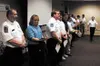 Top, a group of Central Mat-Su Fire and EMS staff receive
special recognition awards at a ceremony at the Emergency Center on
Lucille Street Tuesday. Photo by DANIEL SPOTH/Frontiersman.
