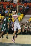 Wasilla junior Alysha Devine goes to the basket during Wasilla's semifinal win over the Colony Knights Friday at the Sullivan Arena in Anchorage. Bruce Eggleston/MatSuSports.net