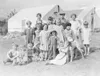 Shortly after arriving in the Matanuska Valley, Colonists lived
in tents until they could build on their new land. (Photo courtesy
National Archives FERA Collection)