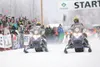 ROBERT DeBERRY/Frontiersman The CC Ski-doo/Global Motor Sports
team of Tyson Johnson and Tyler Aklestad rip down the spectator
lined starting lane on Big Lake Sunday afternoon for the start o