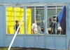 Some booths at the Alaska State Fair are built new every August.
Take a walk around the Alaska State Fair during the week before the
festivities and you'll see hundreds of new ways to use tar