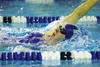 Palmer High senior Millie Snelders does the backstroke during a preliminary run of the 200-yard individual medley at the Palmer Invitational on Friday, Oct. 16. She had the fastest seed time 