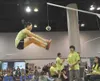 Photo courtesy of Anchorage Convention and Visitors Bureau/photo
by Roy Neese Alice Strick of Wasilla tied the world record of 78
inches in the two-foot high kick at the 2011 NYO Games in
Anc