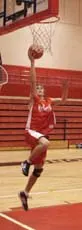 Wasilla's Buddy Bailey works on his lay-up during a drill at the
Warriors basketball practice on Wednesday. Bailey will compete in
his first season with Warriors after transferring to Wasilla
