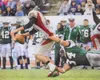 Photo courtesy of the Percak-Dennett family Former Colony High
standout and Bemidji State linebacker George Percak-Dennett brings
down a St. Cloud State player. A major concussion cut the car