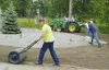 Moose Gardeners volunteers work on landscaping a Palmer High
School entrance. Photo courtesy of ANN KNOBBE.