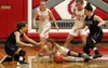 Wasilla senoir Maclaren Obremski battles for a loose ball during a win over Palmer Tuesday, Jan. 23, 2018, at Wasilla High School. Obremski is among those working to fill the void left by six