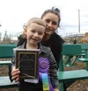 2023 Mullet Mania winner Kendall Toppin and his sister Kaila Rose pose for a photo Jacob Mann/Frontiersman