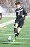 Colony’s Ben Atkinson moves the ball down the field during Colony’s win over Wasilla Thursday. Colony beat West Anchorage 5-0 Friday.The Knights are now 3-0 this season. ROBERT DeBERRY/Fronti