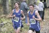 Palmer’s Andrew Liebing, left, and Schyler Knopp work their way
through the boys 4A race. (JEREMIAH BARTZ/Frontiersman)