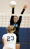 Palmer’s Brecken Riekena gets a block during Palmer’s win over Soldotna Thursday at Palmer High School. ROBERT DeBERRY/Frontiersman.com