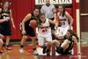 Houston senior Ashley Apangalook picks up a loose ball and runs down the floor during an overtime win over Glennallen Jan. 3 at Houston High School. Photo courtesy of Bruce Egglesto