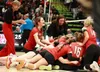 The Wasilla Warriors celebrate after winning the 2023 4A state volleyball title Saturday night in Anchorage. Ron Jones/matsusports.net