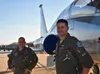 Lt. Col. Adam Markel, left, an F-16 fighter pilot, and Capt. Richard Bergeron, an Introduction to Fighter Fundamentals instructor pilot, pose for a photo at Sheppard Air Force Base, Texas, No