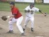 JEREMIAH BARTZ/Frontiersman Nick Rosso hustles back to first
base during Mat-Su’s 4-2 win over the Athletes in Action Fire
Wednesday at Hermon Brothers Field in Palmer.