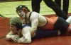 Tran Smyth works a move on his opponent Levi Russell during the
second period of his match in the 160-pound finals Saturday at the
Region III Area 2 wrestling tournament at Houston High Schoo