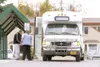 A Wasilla Senior Center employee helps a man onto a MASCOT bus in this Frontiersman file photo. The culmination of a three-year project is reaching fruition with the merger of the MASCOT (Mat