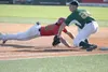 Mat-Su infielder Matt Decker prepares for the throw to first as Alaska Goldpanners outfielder Jacob Hayes slides back safely during Game 1 of the Alaska Baseball League Top of the World Serie