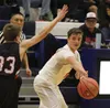 Houston's Kendell Ruta dishes the ball of during a loss to Juneau-Douglas in the Palmer Elks Showdown Friday at Palmer High School. The Hawks rebounded the following day and scored a win over