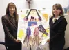 Ruth Josten, left, and Margie Escobar of the Alaska State
Troopers' Child Abuse Investigative Unit, are shown with "The
Mascot," a group project by children in therapy at the Children's
Cente