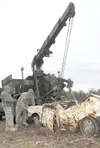 Soldiers assigned to the 207th Combat Support Company, Alaska
Army National Guard, Staff Sgt. Joseluis Villasenor, wheeled
vehicle mechanic, Staff Sgt. Edwin Brunner, motor transport
operator