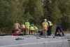 Local emergency services personnel attempt to extricate an 18-year-old female driver from a vehicle involved in a head-on collision on Seldon Road, just east of the entrance to Teeland Middle
