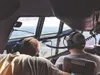 Alaska Air National Guardsmen from the 176th Wing’s 211th Rescue Squadron scan the horizon looking for isolated flood survivors aboard an HC-130J Combat King II aircraft while assisting with 