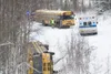 A First Student bus sits on its side off West Sands Drive in
Wasilla Thursday morning around 9:15 a.m. The bus was on its
morning route through the neighborhood when it left the roadway and
s