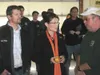 MICHAEL ROVITO/Frontiersman Todd Palin, left, and Gov. Sarah
Palin, center, talk with rally participants in southern
Pennsylvania Friday.