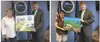 Mat-Su artist Cheryl D. Lacy, right, opted to go with a more traditional painting for her entry into the City of Wasilla’s “Call to Artists” campaign. At left, Beth Libbey’s entry took on a m