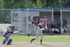 Wasilla's Taylon Ottinger bunts the ball into the air during a 4-3 win over Chugiak Saturday, July 16, 2016, at McManus Field in Wasilla. JEREMIAH BARTZ/Frontiersman