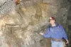 CHRIS GILLOW/Frontiersman Alan Renshay shows tour participants a
quartz vein that runs from Independence Mine to Goldcore Mine.
Saturday was the only day this year the Independence Mine State